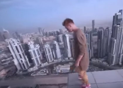 OLEG CRICKET WITH A HOVERBOARD ON THE ROOFTOP OF A DUBAI BUILDING